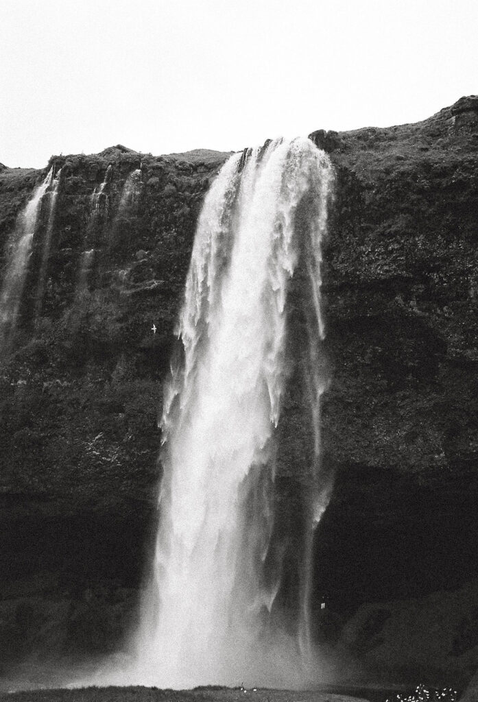 Black and White film photo of a beautiful waterfall in Iceland. 