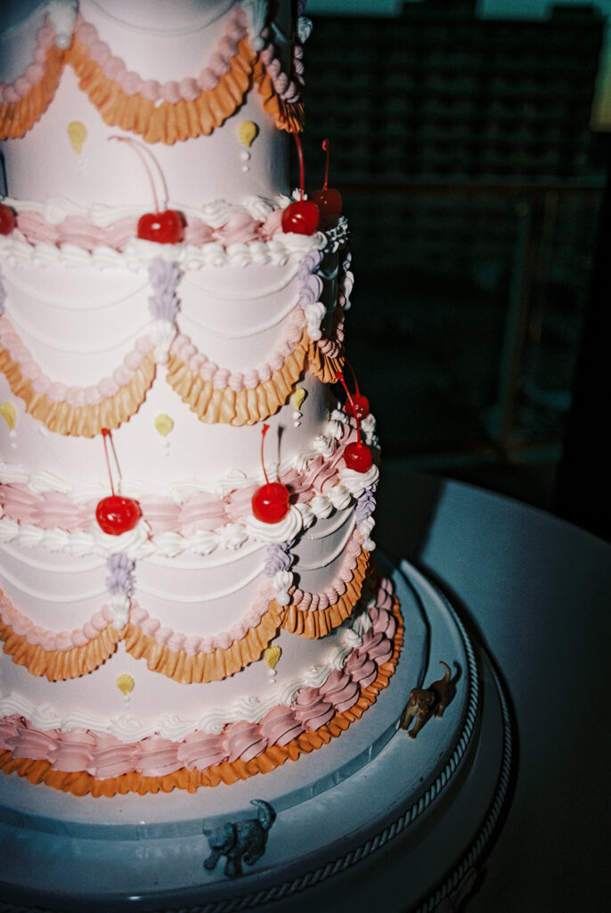 A film scan shows a three tiered vintage inspired wedding cake at a reception held at The Wave Resort in Long Branch NJ