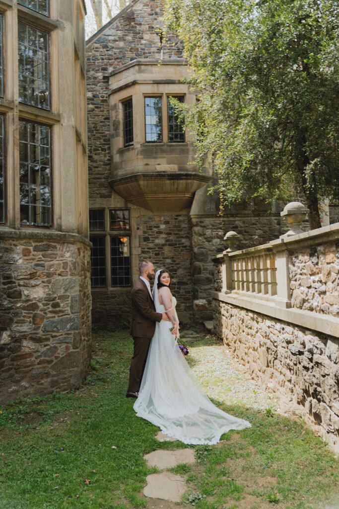 Newlyweds pose for bridal portraits at ridley creek state park mansion