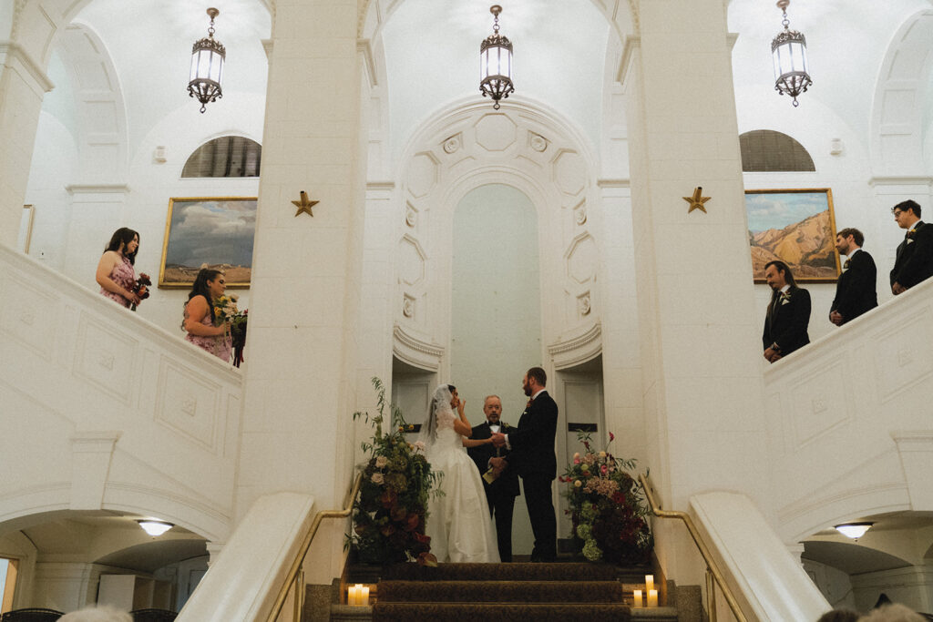 A ceremony is photographed at an art museum philadelphia wedding at the American Swedish Historical Museum 