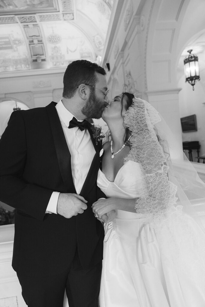 A black and white bridal portait taken at an american swedish museum wedding